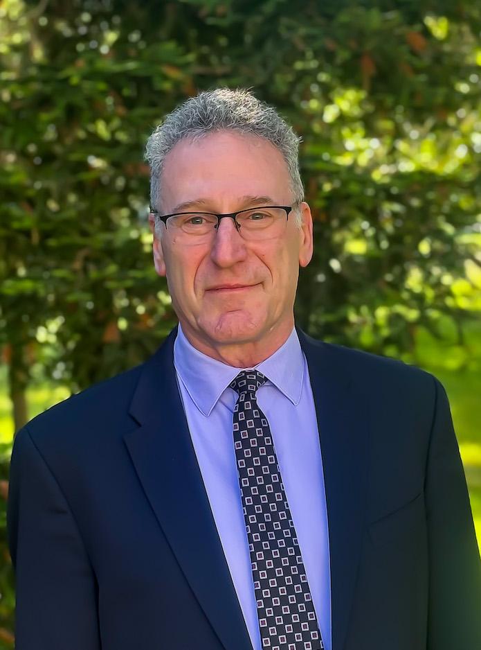 a man in a navy suit